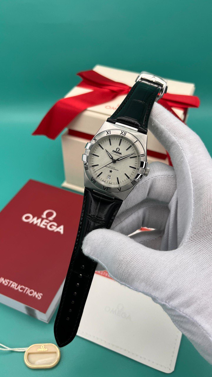 ساعت مچی امگا کانسلیشن بند چرم مردانه صفحه مشکی دور استیل (6)