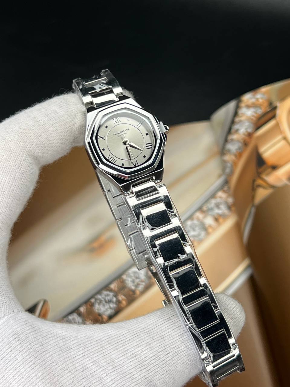 ساعت مچی زنانه رومنسون کلاسیک (18) ساعت مچی زنانه رومنسون کلاسیک صفحه چند ظلعی طوسی بند استیل