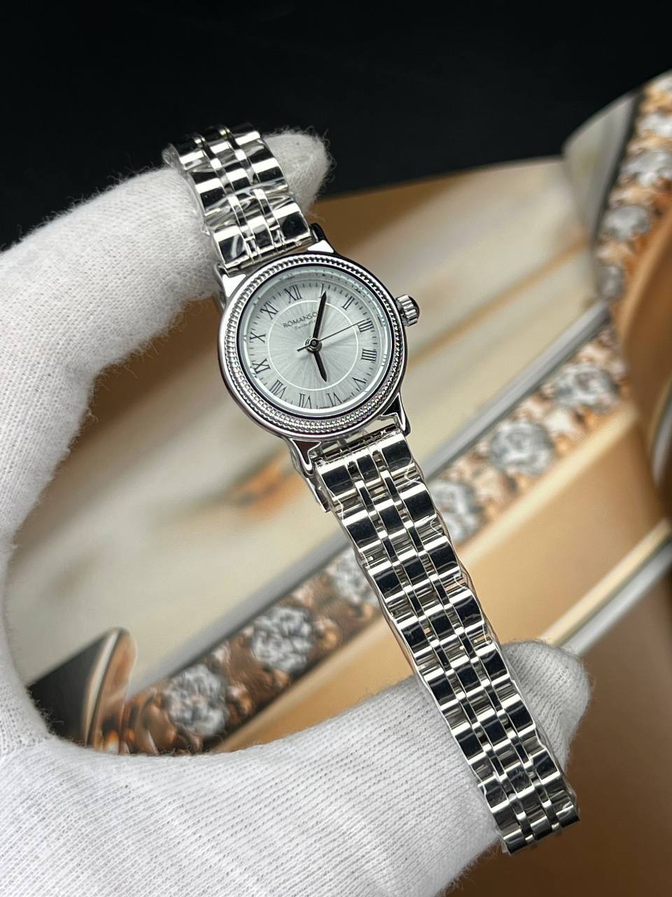 ساعت مچی زنانه رومنسون کلاسیک (2) ساعت مچی زنانه رومنسون کلاسیک صفحه گرد طوسی بند استیل