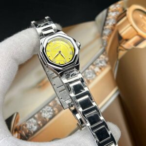 ساعت مچی زنانه رومنسون کلاسیک صفحه چند ظلعی زرد بند استیل