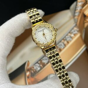 ساعت مچی زنانه رومنسون کلاسیک صفحه گرد سفید نگین دار بند طلایی