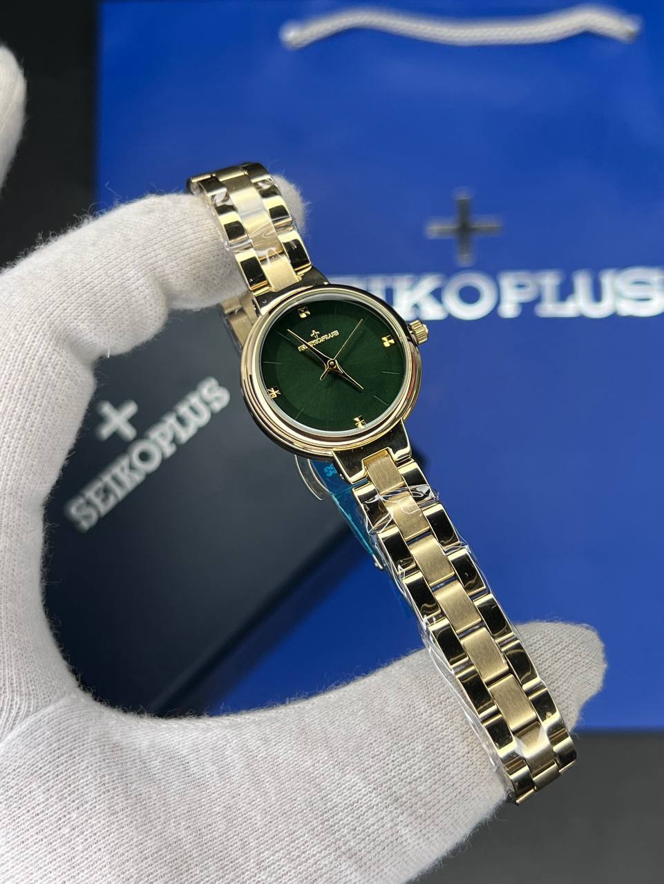 ساعت مچی زنانه سیکو پلاس SEIKO PLUS+ (16) ساعت مچی زنانه سیکو پلاس SEIKO PLUS+ صفحه سبز ساده بند طلایی