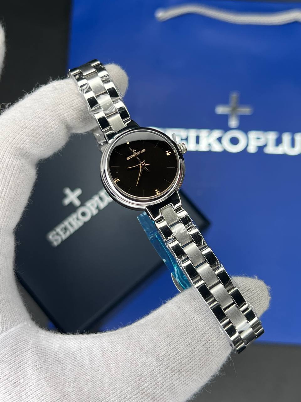 ساعت مچی زنانه سیکو پلاس SEIKO PLUS+ (20) ساعت مچی زنانه سیکو پلاس SEIKO PLUS+ صفحه مشکی ساده بند استیل