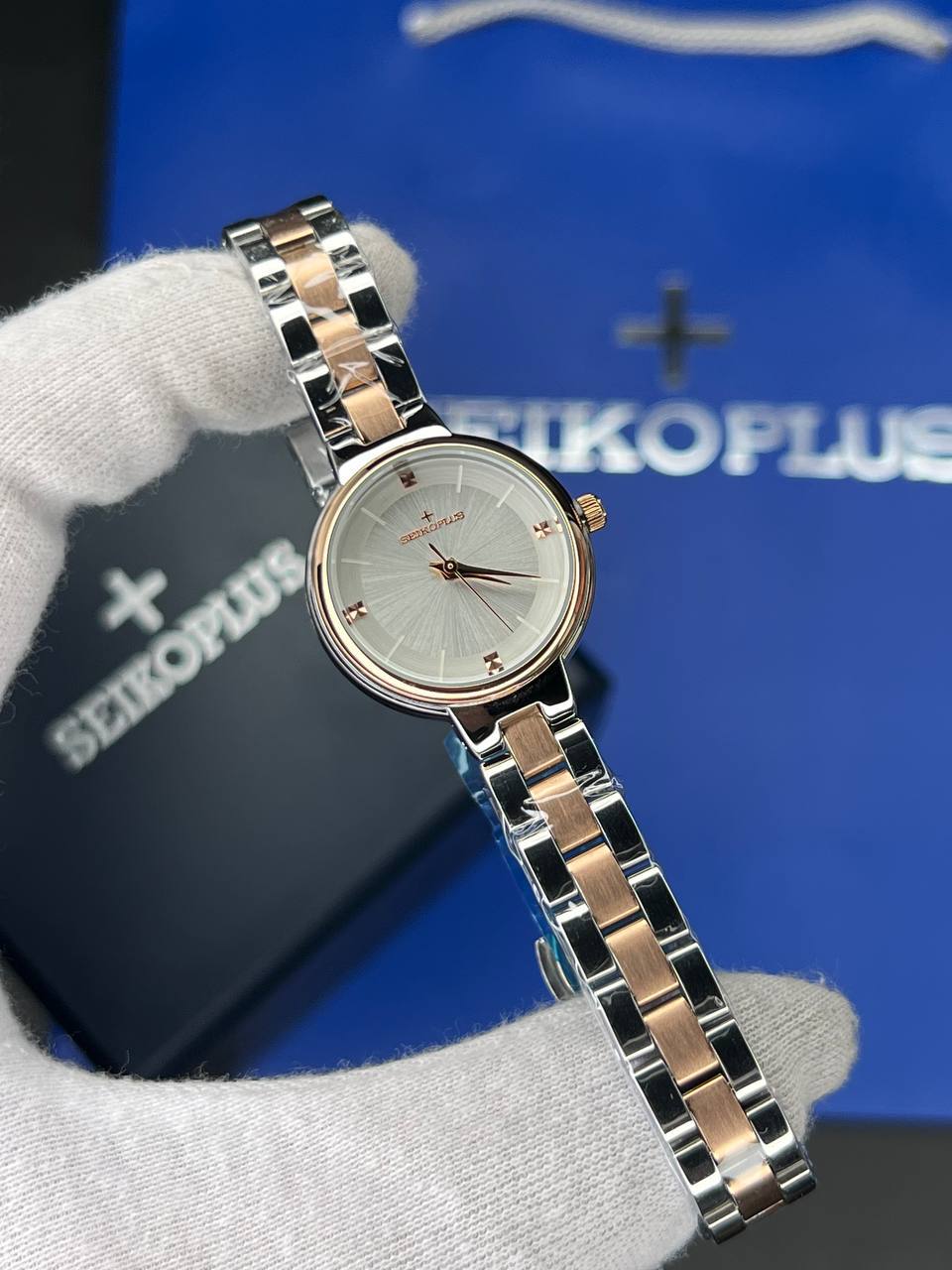 ساعت مچی زنانه سیکو پلاس SEIKO PLUS+ (21) ساعت مچی زنانه سیکو پلاس SEIKO PLUS+ صفحه طوسی ساده بند استیل رزگلد