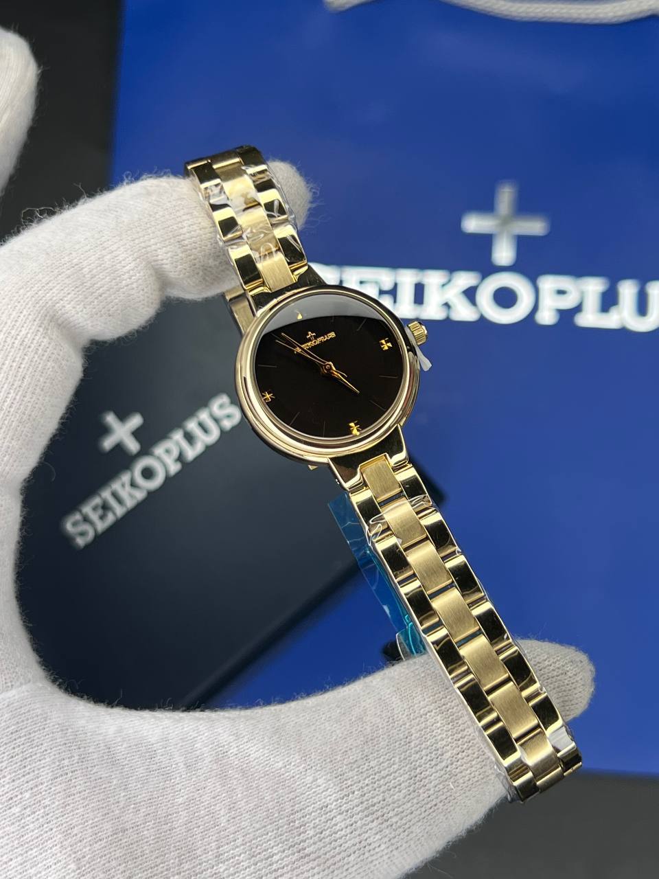 ساعت مچی زنانه سیکو پلاس SEIKO PLUS+ (22) ساعت مچی زنانه سیکو پلاس SEIKO PLUS+ صفحه مشکی ساده بند طلایی