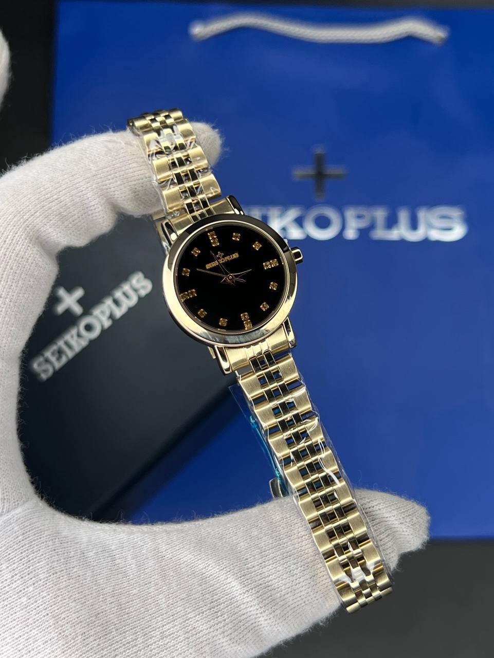 ساعت مچی زنانه سیکو پلاس SEIKO PLUS+ (31) ساعت مچی زنانه سیکو پلاس SEIKO PLUS+ صفحه مشکی نگین دار بند طلایی