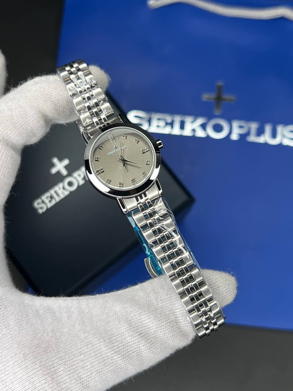 ساعت مچی زنانه سیکو پلاس SEIKO PLUS+ (33) ساعت مچی زنانه سیکو پلاس SEIKO PLUS+ صفحه خاکی نگین دار بند استیل