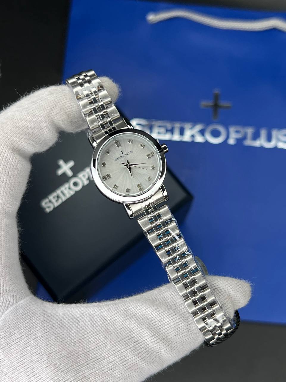 ساعت مچی زنانه سیکو پلاس SEIKO PLUS+ (35) ساعت مچی زنانه سیکو پلاس SEIKO PLUS+ صفحه طوسی نگین دار بند استیل