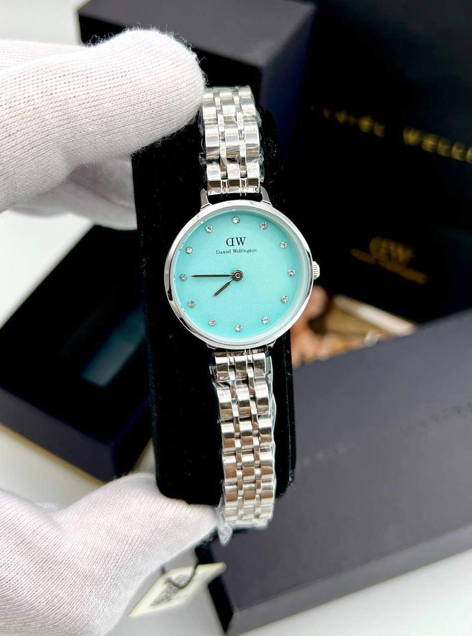 ساعت مچی زنانه دنیل ولینگتون DW (6) صفحه فیروزه ای بند استیل